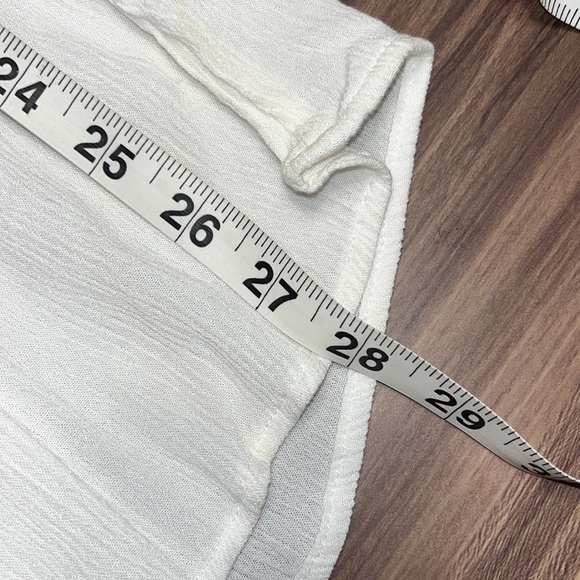 White dress with blue floral design. - Picture 8 of 10